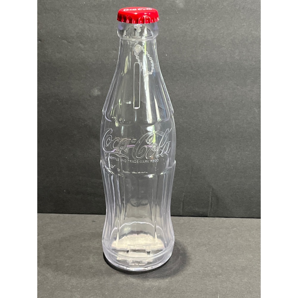Vintage 2002 Coca-Cola Clear Plastic Contour Bottle Coin Bank 8.5 Inch Red Cap